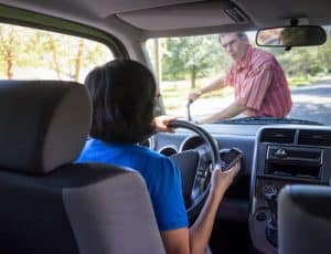 Woman hitting cyclist