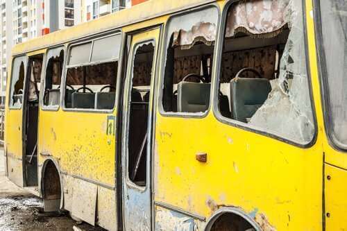 Glass busted out from a bus crash vehicle ejection